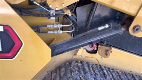 cat skid steer hydraulic oil drain|cat 259b3 hydraulic oil drain.